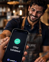 A shop owner confirming a customer's offer on a phone